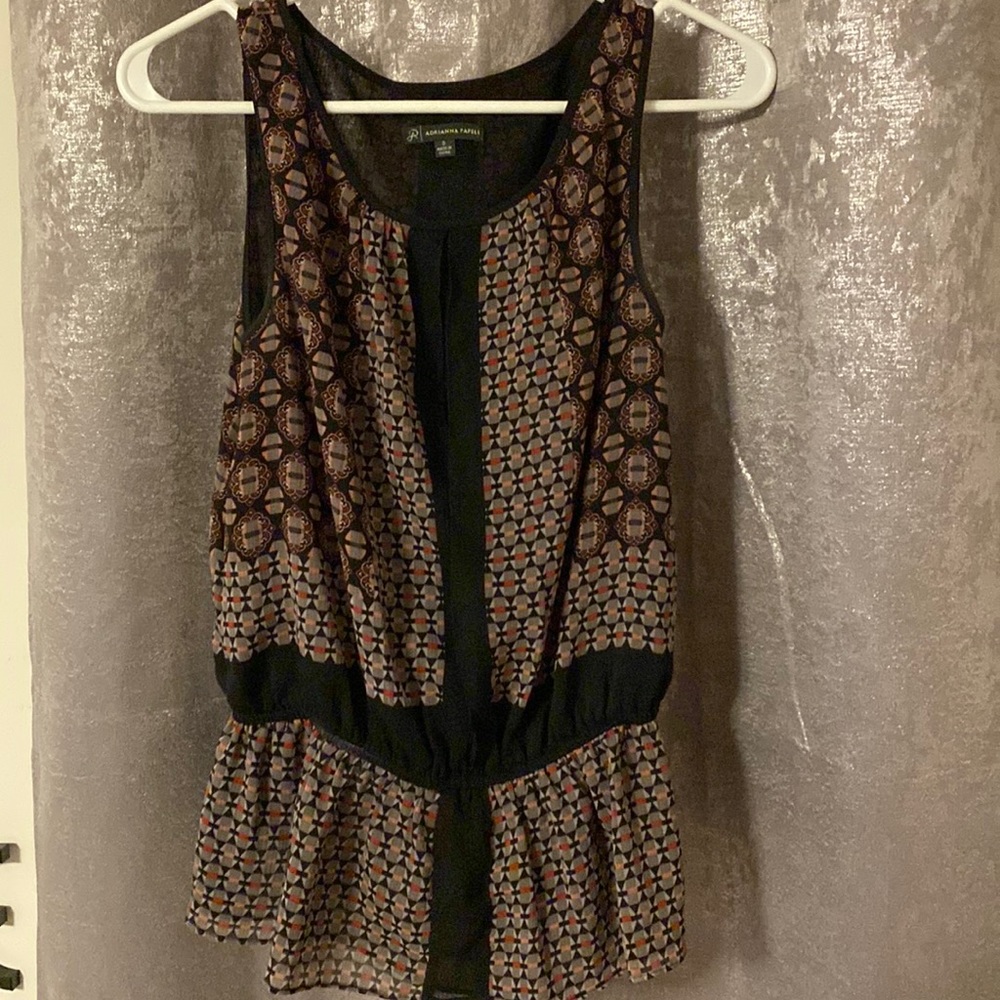 Sleeveless patterned blouse with sheer underlay